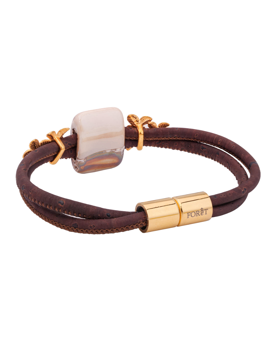 Introducing the IBERIS Cork Bracelet: where sustainable cork meets contemporary elegance. Lightweight, with a magnetic clasp for easy wear, adorned with floral motifs and ceramic stones. Stylish, eco-conscious jewelry.